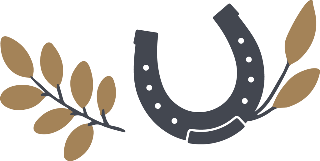 Decorative image with gold leaves and a gray horseshoe