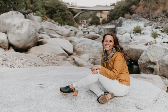 Image of Kayle Martin in front of the Yuba River in California